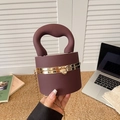 Deep purple cylindrical handbag with chunky handle and gold chain strap for women - Cylindrical Shape / Brown