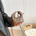Mini brown crossbody bag featuring vintage plaid ruffle handle and smooth faux leather finish - Brown