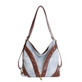Borsa in denim azzurro con finiture in pelle marrone e dettagli di borchie retrò - Blu