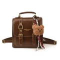 Vintage Lederrucksack in Braun mit goldenen Schnallen und Bärenanhänger für Damen - Mit Anhänger / Braun