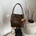 Retro dark brown leather bucket bag with gold clasp and cherry charm accessory - Without Pendant / Brown