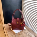 Retro burgundy bucket bag with golden lock and cherry charm on a white book - Without Pendant / Burgundy