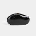 Sleek black patent PU leather pebble-shaped clutch bag with elegant gold metal cylinder clasp - Black
