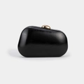 Elegant black glossy pebble-shaped evening clutch bag with a round gold metallic clasp - Black