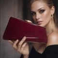 Luxurious deep red snake pattern clutch bag with gold metallic trim and clasp - Glossy Patent Leather / Burgundy