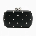 Detail of black evening clutch bag with silver studs and spherical metal clasps - Oval Shape (Silver Studs) / Black
