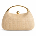 Detail of woven raffia texture and polished gold metal handle on a luxury dinner clutch bag - Apricot