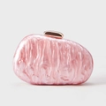 Detail of pink marble acrylic shell clutch bag with rose gold metallic clasp closure - Lotus Pink