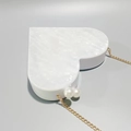 Heart-shaped pearlescent acrylic evening bag with pearl clasp and gold chain strap - Pearlescent White