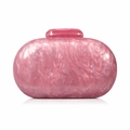 Macro view of pink marble texture acrylic evening clutch with shell-like pearlescent finish - Pink