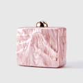 Detailed macro view of pink marble texture on acrylic evening clutch with gold ball lock - Lotus Pink