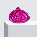 Macro detail of fuchsia acrylic clutch with marble texture and concentric wave patterns - Rose Red