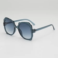 Occhiali da sole oversize blu traslucidi con montatura ondulata e lenti sfumate - Montatura Blu Grigio Lenti Sfumate Blu