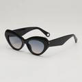 Fashionable cat eye sunglasses with black frames and blue-orange gradient lenses at 45 degree - Black Frame Gradient Grey Yellow Lens