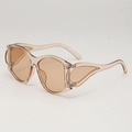 Chique oversized punk zonnebril in transparant theebruin met uniek vlamontwerp op frame - Helder Thee Frame Thee Lens