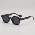 Retro geometric blue sunglasses with tortoise shell arms and silver rivet accents - Blue Frame Tortoise Legs Gray Lens