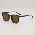 Classic square black sunglasses with brown lenses shown from a 45-degree angle view - Black Frame Tea Lens