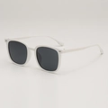 Modern white square frame sunglasses with dark lenses shown from a 45-degree angle - White Frame Gray Lens