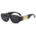 Occhiali da sole retrò cat-eye con montatura nera e accenti in metallo dorato sulle aste - Montatura Nera Lenti Grigie