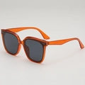 Modern square sunglasses in translucent orange frames with grey lenses and silver rivets - Orange Frame Gray Lens