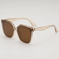 Champagne translucent square frame sunglasses with dark brown lenses in a side view - Transparent Tea Frame Tea Lens