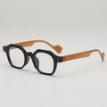 Retro geometric black square glasses with translucent amber temples and rivet details - Black Frame Orange Legs Clear Lens