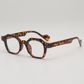 Retro geometric tortoiseshell sunglasses with thick frames and metal rivet accents - Tortoise Frame Clear Lens