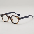 Retro geometric sunglasses featuring tortoiseshell frames and navy blue temple arms - Tortoise Frame Blue Legs Clear Lens