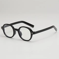 Classic black oval frame sunglasses with silver metallic accents for a stylish retro look - Black Frame Clear Lenses