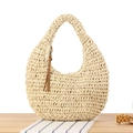 Minimalist beige woven straw hobo bag with brown leather tassel zipper detail - Beige