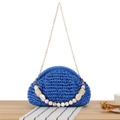 Fashionable royal blue woven clutch bag with marble bead handle and golden chain strap - Blue