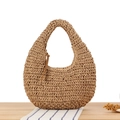 Chic khaki straw tote handbag with leather charm for summer beach vacation styling - Camel
