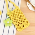 Handmade yellow woven cotton rope phone bag with a green floral charm detail - Yellow + Green Flower