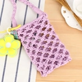 Handmade purple macrame cross-body bag with yellow sunflower charm on wooden background - Purple + Yellow Flower