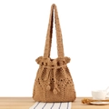Handmade crochet shoulder bag in khaki with woven patterns and decorative tassels - Camel