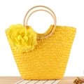 Handmade bright yellow straw tote bag with large floral accent and round wooden handles - Yellow