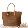 Brown paper rope woven tote bag with leather handles on a rustic wooden table - Dark Brown