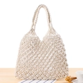Chic cream white woven shoulder bag with bohemian hollow pattern for beach or daily use - White