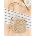 Handmade woven hollow straw crossbody bag in beige with decorative tassel detail - Beige