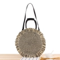 Borsa rotonda in paglia intrecciata nera e beige con frange e tracolla - Nero
