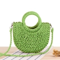 Semi-circular woven straw handbag in bright green with adjustable crossbody strap - Green