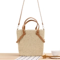 Minimalist beige woven tote bag with brown leather handles and adjustable shoulder strap - Beige