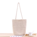 Beige hand-woven cotton rope shoulder bag with wavy scalloped edge detail for beach - White