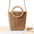 Natural straw handbag with circular handles and woven straps in a rustic aesthetic - Camel
