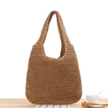 Handmade woven tote bag in natural brown straw finish for casual beach outings - Camel