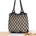Black woven mesh beach bag with wooden ring handles and a beige canvas lining pouch - Black