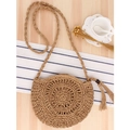 Handgefertigte beige runde Häkeltasche mit Blumenmuster und Quastendetail - Kamel Quasten-Stil