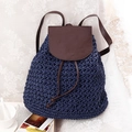 Dark blue woven paper rope backpack with brown leather straps for beach holidays - Blue