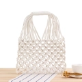 White macrame hollow hand-woven beach bag with reinforced handles and bohemian style - White