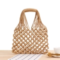 Handmade woven cotton rope beach bag in khaki color with hollow mesh pattern for summer - Camel